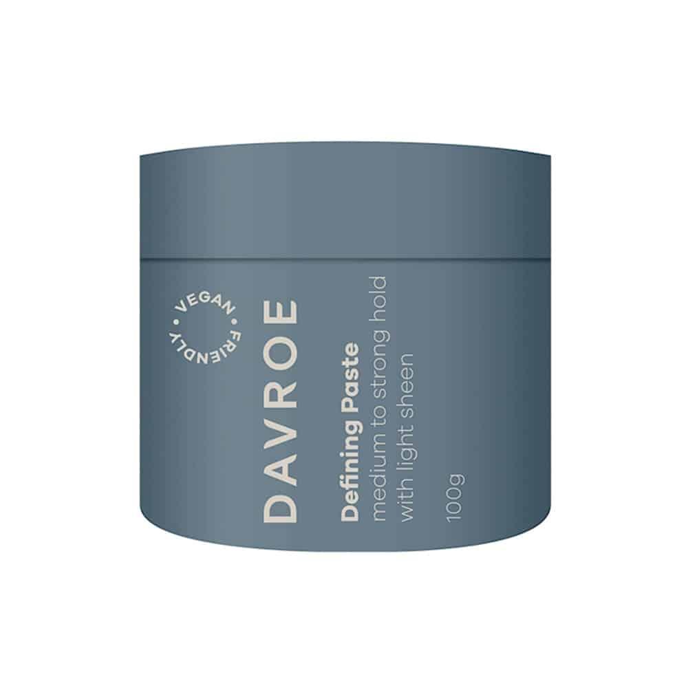 Davroe Defining Paste 100g in a sleek jar, showcasing its smooth, creamy texture for versatile hairstyling.